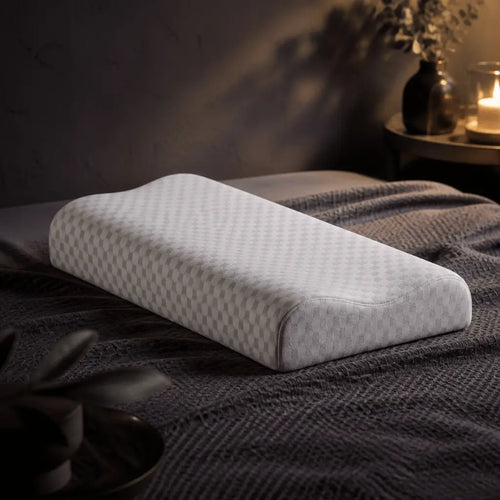 DreamCurve orthopedic memory foam neck pillow providing ergonomic support for comfortable sleep and neck relief.